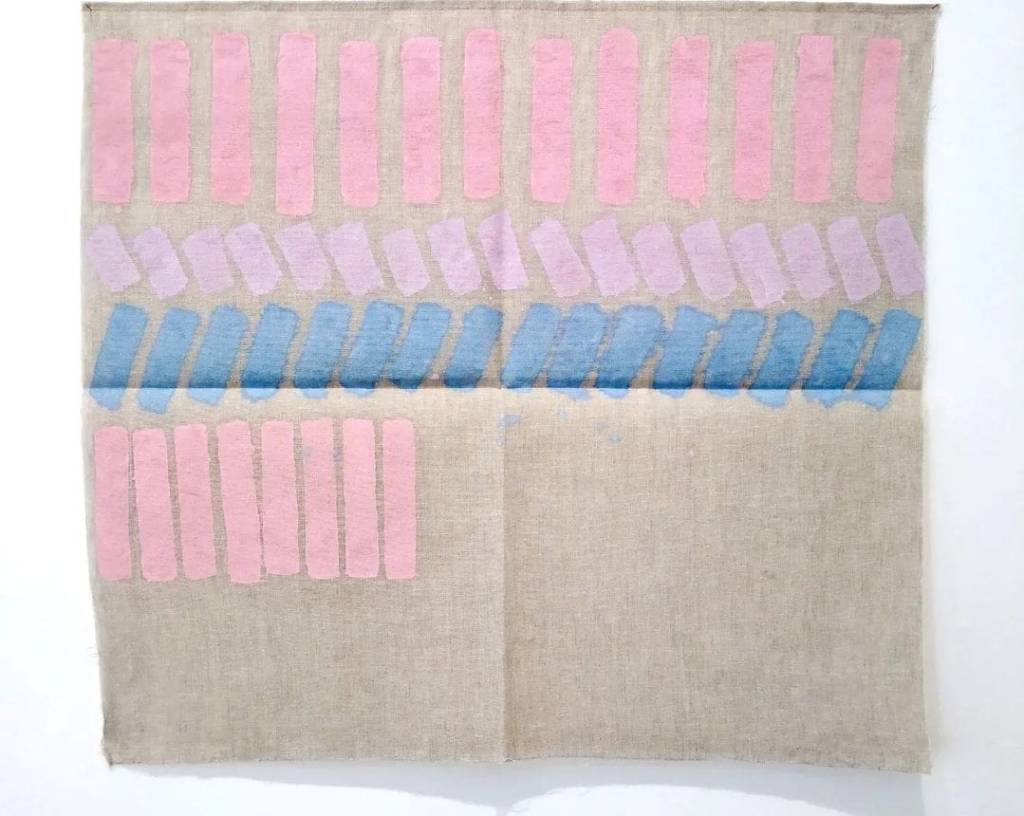 Artwork by Giorgio Griffa, “Quattro colori” (1978). Acrylic on jute, 104 × 113 cm. Image shows four vertical color bands applied with visible brushstrokes on an unprimed jute surface.